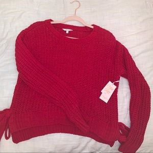 a cute red sweater